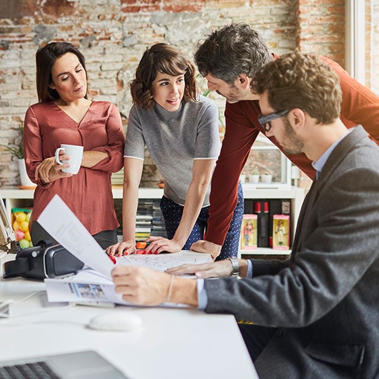 small group of colleagues having a discussion