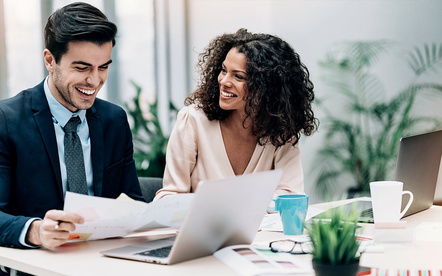 man and woman having a meeting