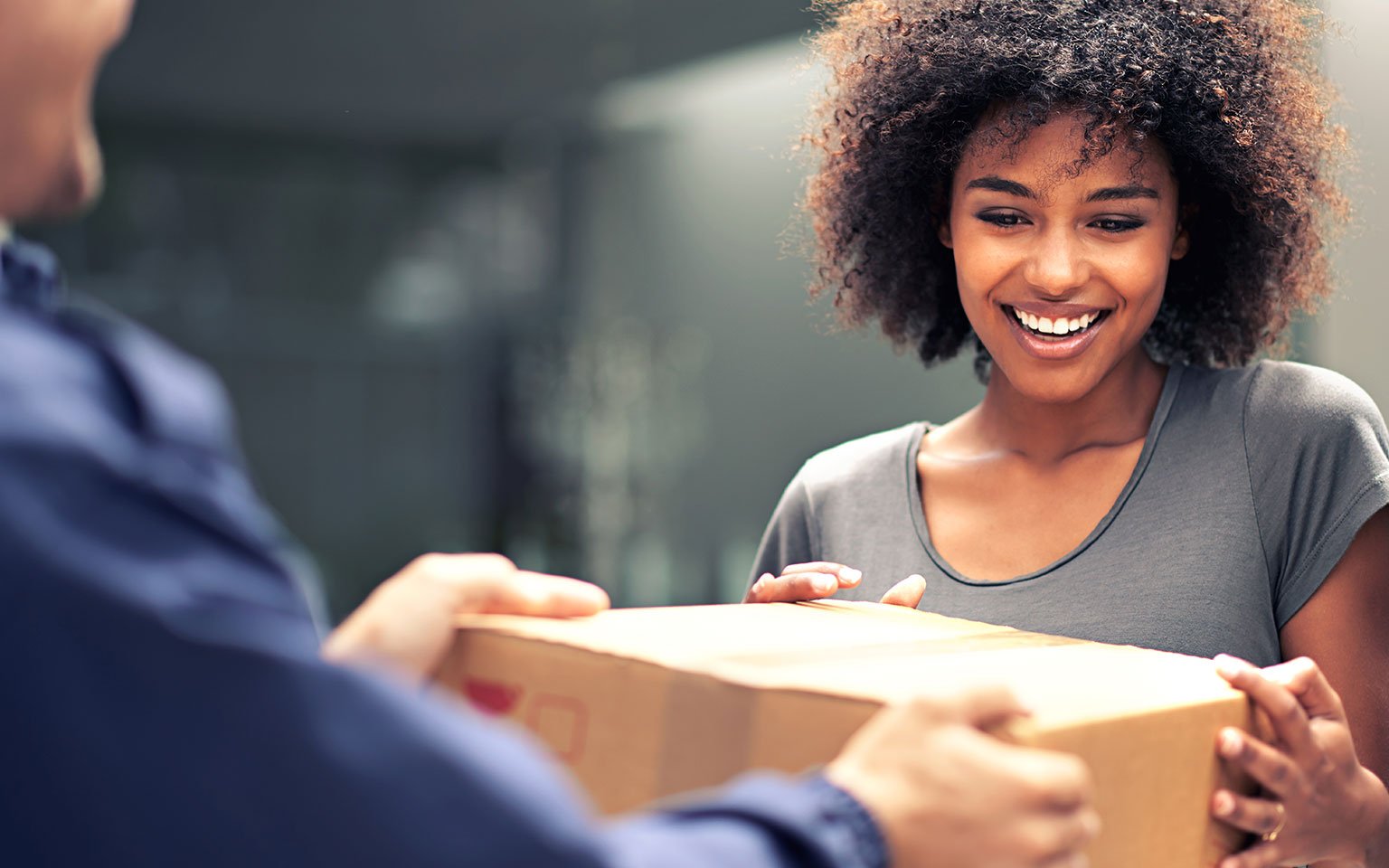 woman receiving parcel 